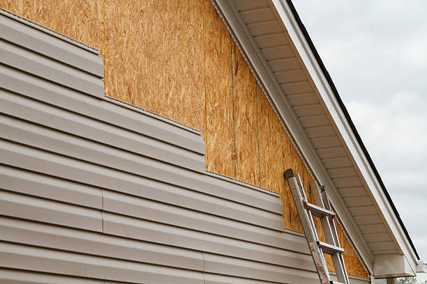 Professional Emergency Siding Repair technician working in Greensboro, PA